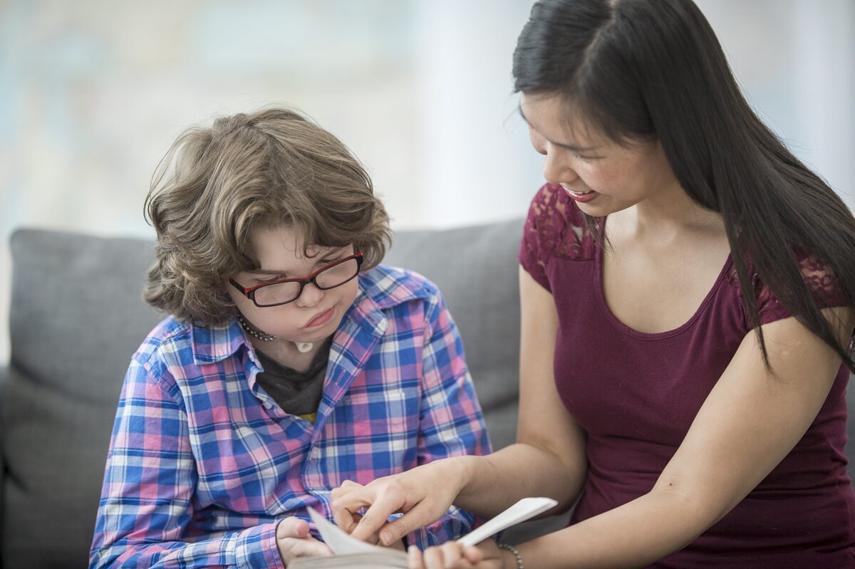 Parent supporting a child